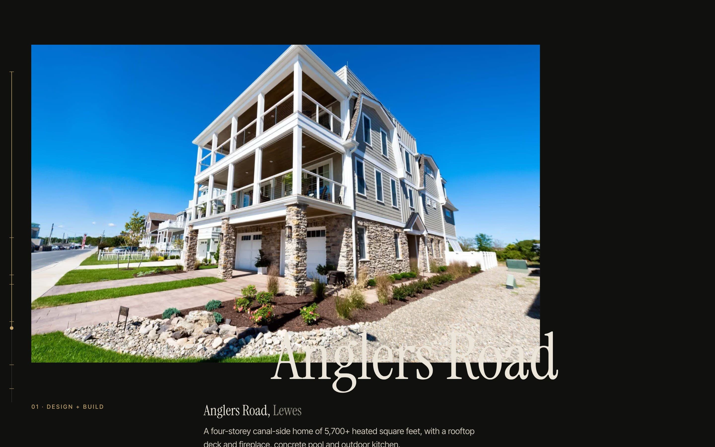 A finished canal-side home with a stone base and wraparound decks, from the homes section.